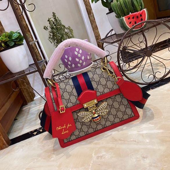 G*u*i top handle bags